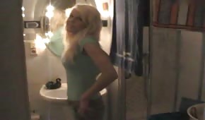 Blondi peeing in the toilet