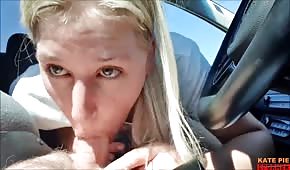 Pretty babe sucks cock in the car